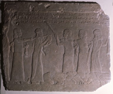 Elamite kings forced to act as servants at Ashurbanipals court