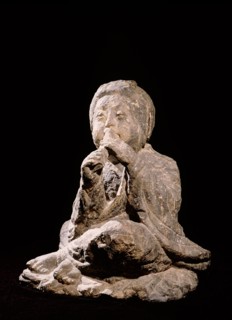 Tomb figure of a seated female musician