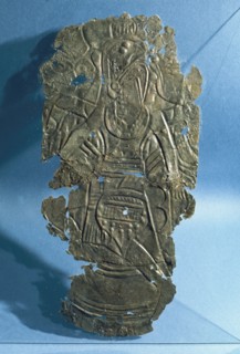 Southern Cult figure embossed on copper
