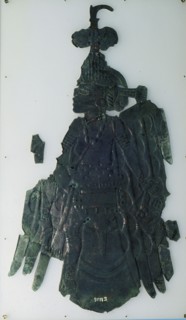 Southern Cult figure embossed on copper
