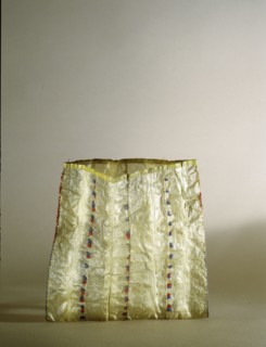 Storage bag made from strips of walrus intestine decorated with coloured pieces of cloth obtained from Russian traders