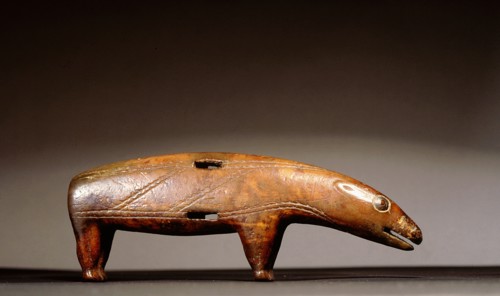 An ivory carving of a polar bear, probably a knife handle
