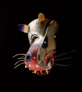 Polychrome mask in the form of a stylized representation of an animal head