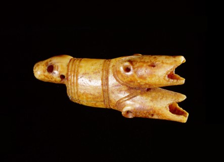 Drag handle with three heads one is a seal and the other two are probably polar bears
