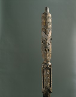 A Maori figure from the ridgepole of a meeting house or storehouse