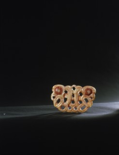 Bone pekapeka, two headed breast ornament