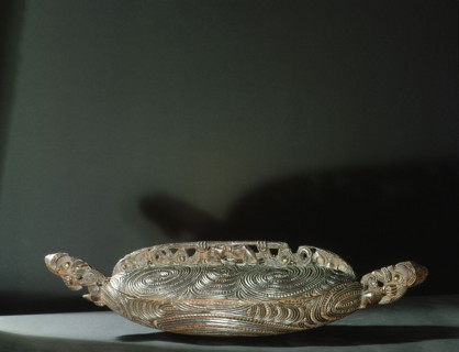 A papahou, flat treasure box, used to hold ornaments that had been worn on the head of a chief and were therefore tapu