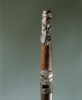 Putorino, or flute trumpet carved with three aggressive faces