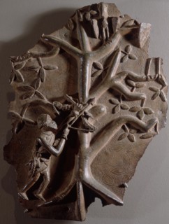 A plaque depicting a hunter, possibly a Portuguese soldier, armed with a crossbow