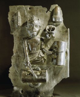 Plaque with a representation of a drummer