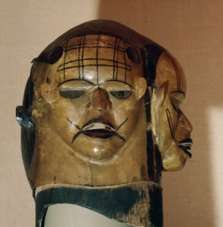 A janiform mask used in the Ekpo (ancestor spirit) secret society which formerly exercised governmental functions among the Ekoi