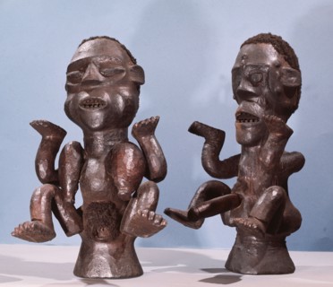 These headpieces were attached to a basketry cap and held in place by a leather strap under the wearers chin