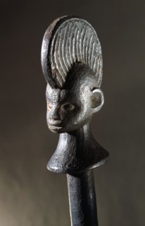 Wooden calabash stopper representing the head of a young unmarried Igbo woman