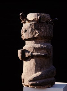 Drum in the form of a kneeling woman with an offering bowl