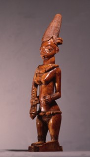 An ivory figure of a standing female which was probably a shrine figure