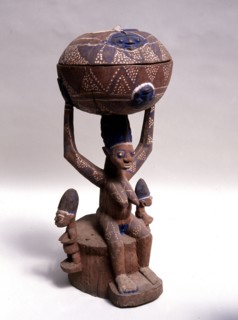 Figure of a woman supporting a large bowl