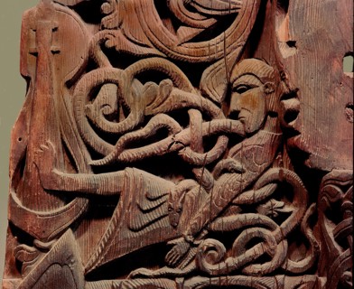 Detail of a carving from a stave church portal illustrating the story of Sigurd