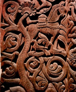 Detail of a carving from a stave church portal illustrating the story of Sigurd