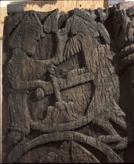 Detail of a carving from a stave church portal illustrating the story of Sigurd