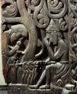 Stave church carving with a scene from the story of Sigurd