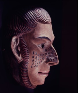 Mask of a red haired European sailor or trader