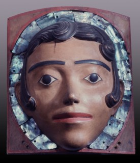 A dance headdress representing a spirit, possibly of a white woman