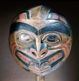 A shamans rattle carved with the design of a killer whale