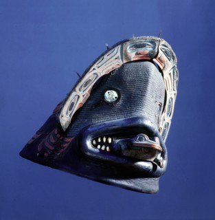 A defensive head piece made of wood and covered with leather