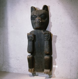 Carved house post which relates to the mythological tale of Bear mother