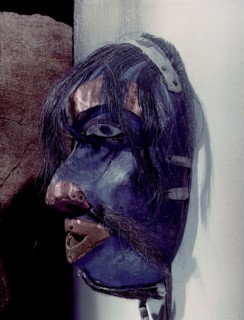 Shamans mask in the form of a human face