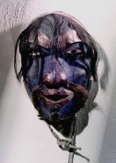 Shamans mask in the form of a human face