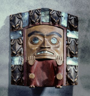 Head plaque with frog totems