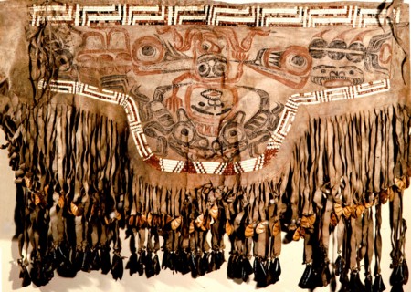Shamans fringed apron made of double caribou skin and painted in red and black
