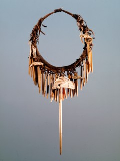 Part of a Haida shamans gear included a neckring from which various bone charms were suspended