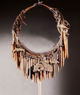 Part of a Haida shamans gear included a neckring from which various bone charms were suspended