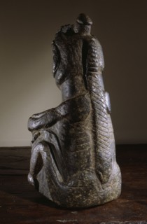 Stone human figure bowl, thought to have been used by Salish shamans in purification rites as part of ceremonies marking the onset of female puberty