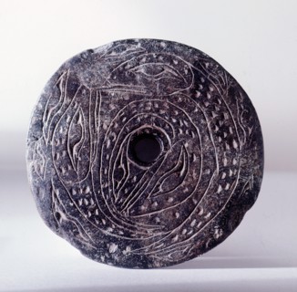 Spindle whorl, used by the Coast Salish during spinning to prevent the wool slipping from the spindle