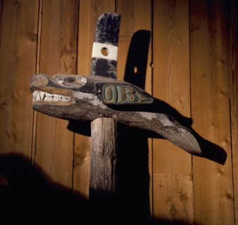 Mortuary pole with killer whale totem