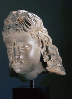 Head of Bodhisattva Maitreya, the Buddha of the Future, part of a triptych