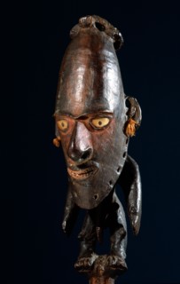 Figural stopper from a flute