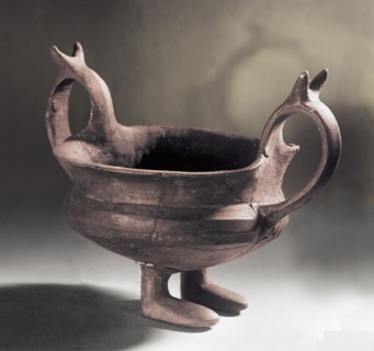 Small vessel set on human feet with high set handles