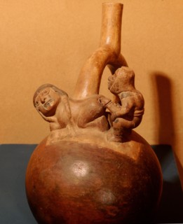 Stirrup spouted vessel depicting a copulating couple