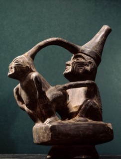 Stirrup spouted vessel depicting  copulating couple