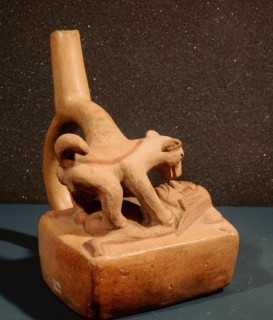 Stirrup spouted vessel depicting a woman copulating with a dog
