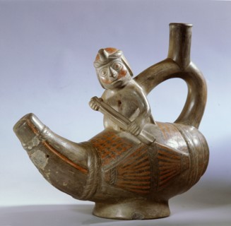 Stirrup spouted effigy showing a Mochica fisherman paddling a small totora reed boat