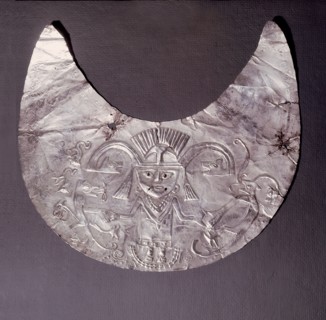 Pendant made from a thin sheet of hammered silver