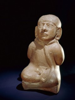 Mochica vessel in the form of a seated prisoner with his hands bound behind his back