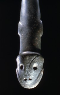 Taino stone ceremonial axe with schematic animal head on handle