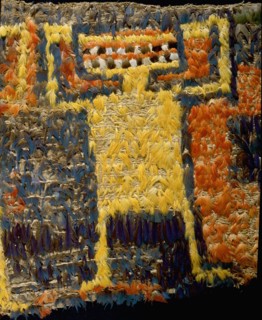 Featherwork tabbard depicting stylised deities