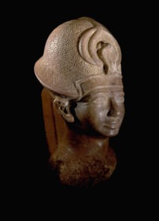 Statue depicting the Pharaoh Amenhotep III wearing the Blue Crown (khepresh)